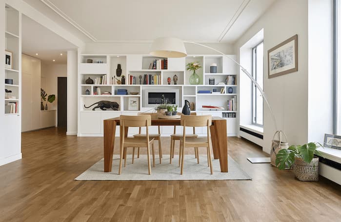 vinyl flooring for dining room with dining table and wood chairs and decorative white shelves