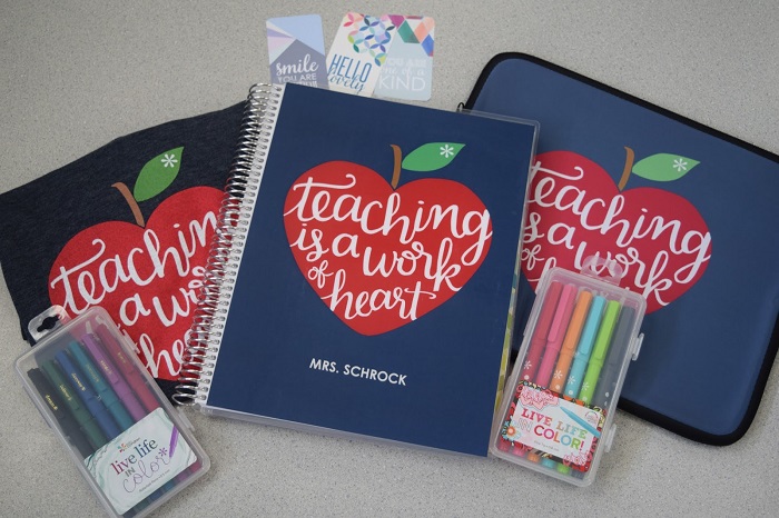 Teacher planner and pencils