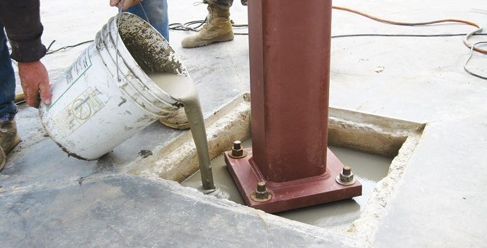pouring cement grout