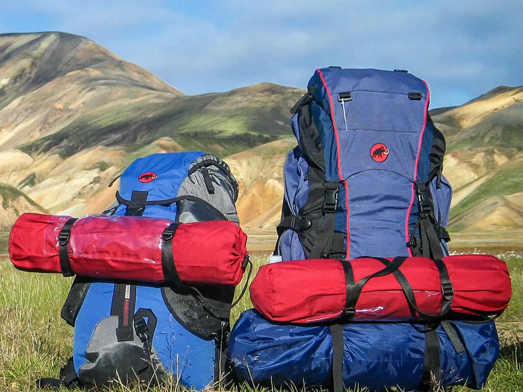 two loaded hiking backpacks